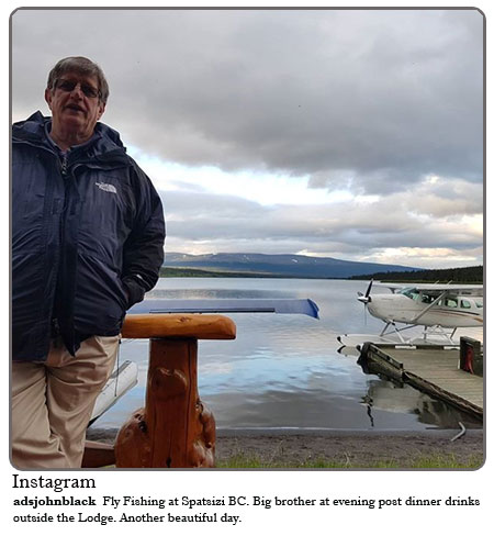 Fly Fishing at Spatsizi BC. Big Brother at evening post dinner drinks outside the Lodge. Another beautiful day.