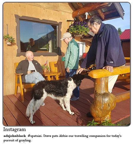 Spatsizi - Steve pats Abbie our travelling companion for today's pursuit of grayling. 