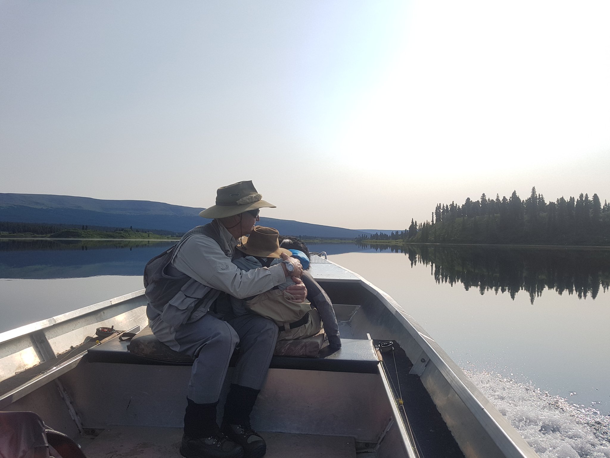 Setting out early morning at Spatsizi to chase Artic Grayling with Abby the Munsterlander in charge.