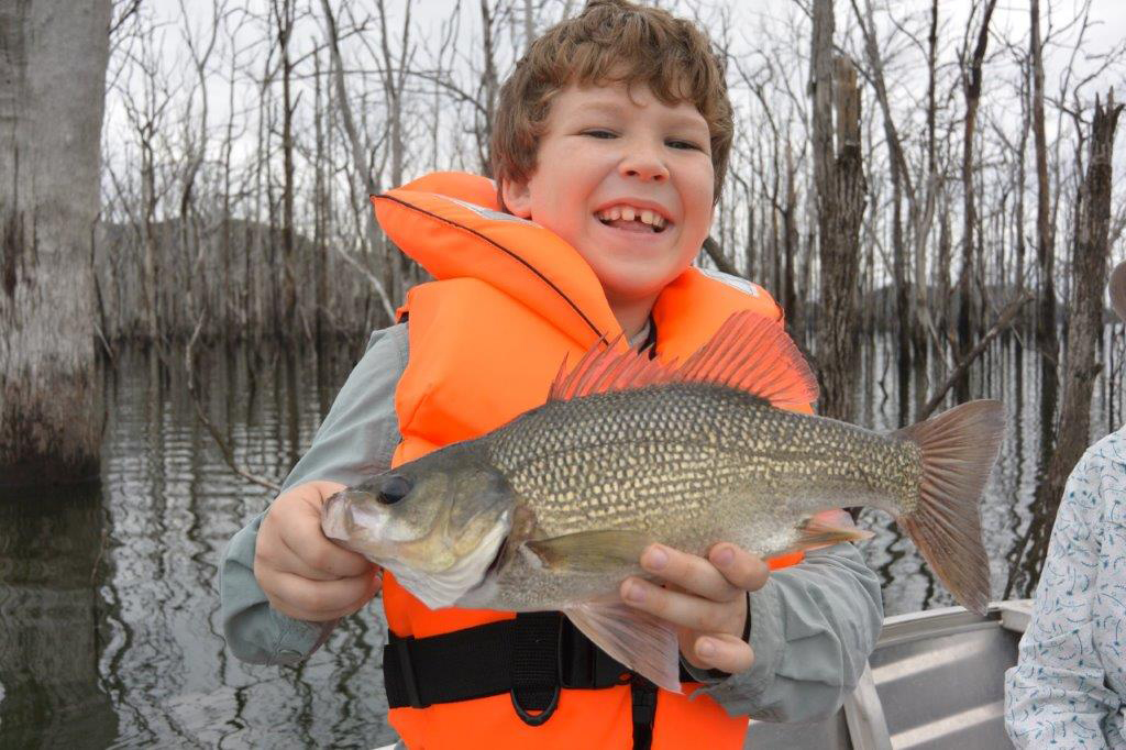 John and his catch, Family Fishing Trip to Hinze Dam, Qld
