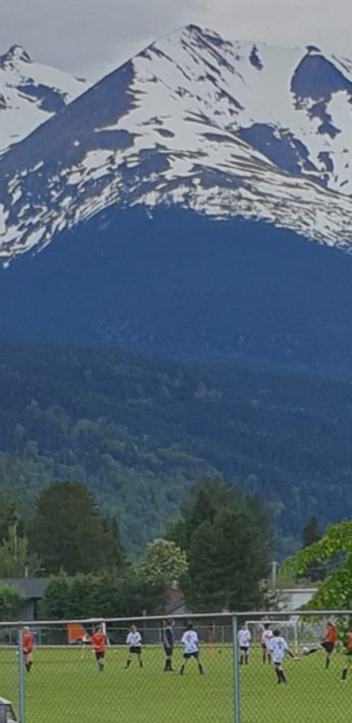 We had an afternoon to spare in beautiful downturn Smithers and paused, en route to the off licence, for this stunning shot of a twilight soccer match. Qld doesn't have the snowy backdrop, but it could have twilight sport with daylight saving.