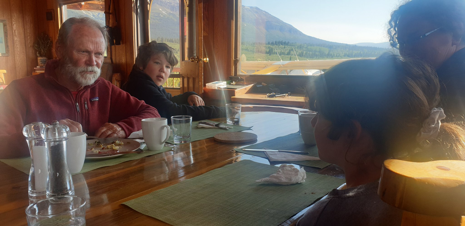 Ray Collingwood our master guide, is taking the young-uns out fishing today. Here he's getting to know them at breakfast.